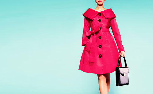 Woman wearing fashionable red coat Stock Photo