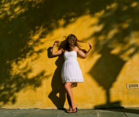 Woman wearing white dress Stock Photo