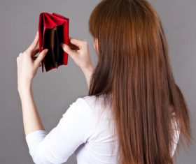 Woman with rummage purse Stock Photo