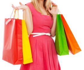 Young beauty holding various color shopping bags Stock Photo 02
