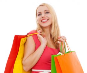 Young beauty holding various color shopping bags Stock Photo 03
