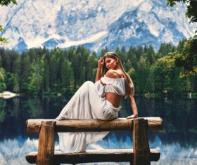 Young happy woman on the lake Stock Photo 03