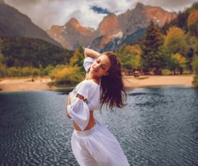 Young happy woman on the lake Stock Photo 06