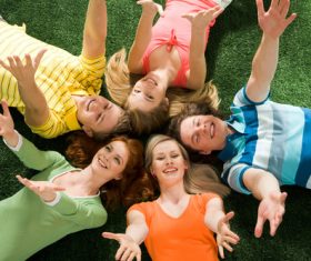 Young man lying on the grass Stock Photo 06
