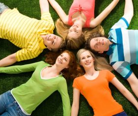 Young man lying on the grass Stock Photo 07