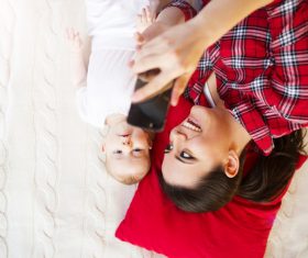 Young mother taking care of baby at home Stock Photo 05