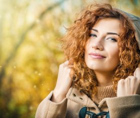 Young woman wearing a hooded coat Stock Photo