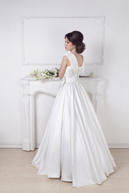 Beautiful charming bride in wedding luxurious dress Stock Photo 09