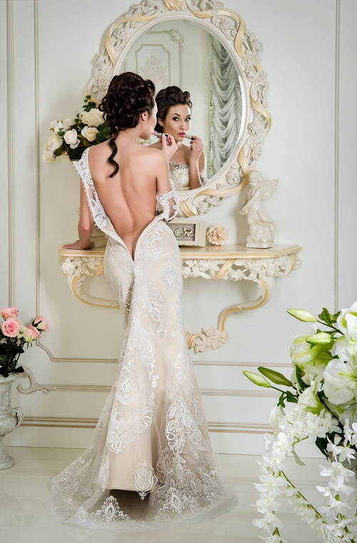 Beautiful charming bride in wedding luxurious dress Stock Photo 14