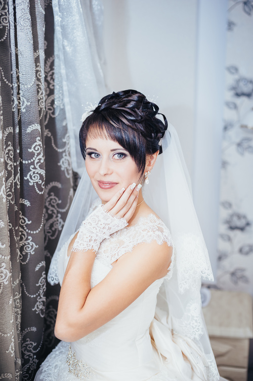 Beautiful charming bride in wedding luxurious dress Stock Photo 16
