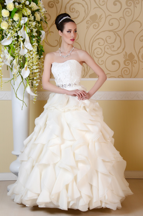 Beautiful charming bride in wedding luxurious dress Stock Photo 18