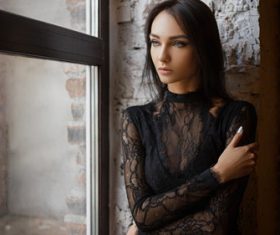 Beautiful girl wearing black lace dress Stock Photo