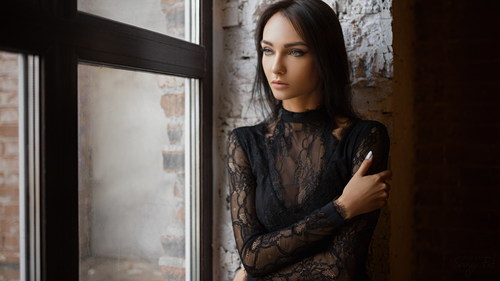 Beautiful girl wearing black lace dress Stock Photo