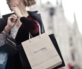 Beautiful woman carrying shopping bags Stock Photo 02