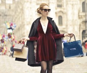 Beautiful woman carrying shopping bags Stock Photo 03