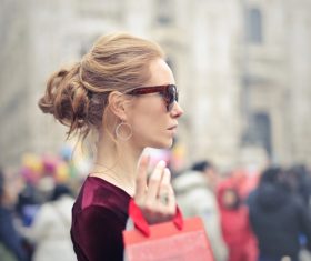 Beautiful woman carrying shopping bags Stock Photo 05