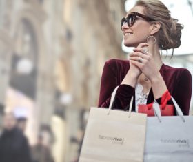 Beautiful woman carrying shopping bags Stock Photo 07