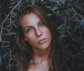Beautiful young woman with blue eyes Stock Photo