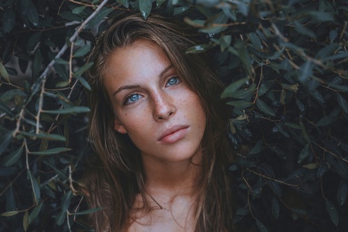 Beautiful young woman with blue eyes Stock Photo
