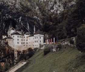 Built against the castle of the mountain Stock Photo 01