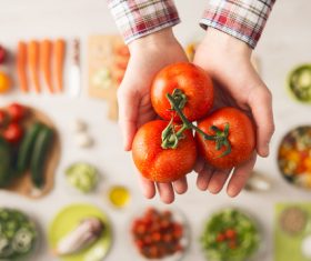 Cleaning tomato Stock Photo 01