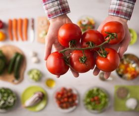 Cleaning tomato Stock Photo 02