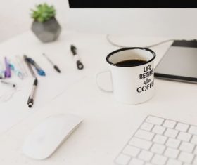 Coffee and mouse close-up on the table Stock Photo