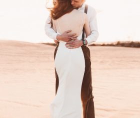 Desert affectionate wedding photos Stock Photo