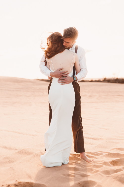 Desert affectionate wedding photos Stock Photo