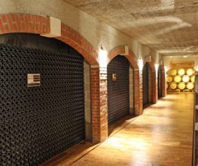 Large capacity wine barrels stored in the basement Stock Photo 03