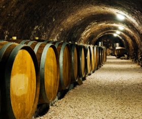 Large capacity wine barrels stored in the basement Stock Photo 04