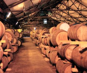 Large capacity wine barrels stored in the basement Stock Photo 05