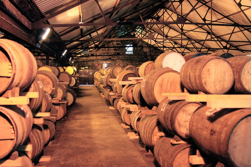 Large capacity wine barrels stored in the basement Stock Photo 05