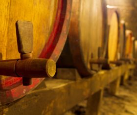 Large capacity wine barrels stored in the basement Stock Photo 06