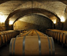 Large capacity wine barrels stored in the basement Stock Photo 10