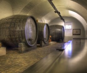 Large capacity wine barrels stored in the basement Stock Photo 11