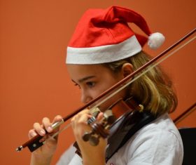 Little girl playing the violin Stock Photo