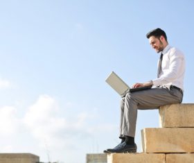 Man working with laptop Stock Photo 04