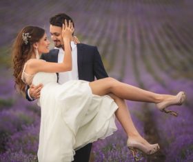 Outdoor lavender flower field wedding photo