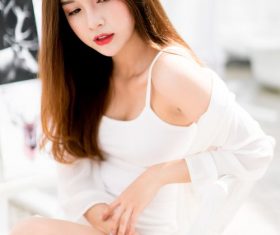 Red lips long hair sling dress up beauty Stock Photo