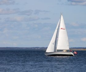 Small sailing boat at sea Stock Photo 01