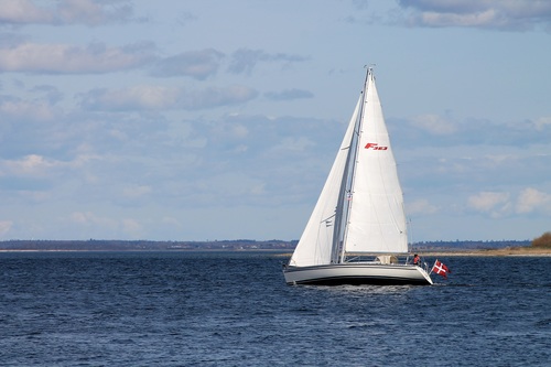 Small sailing boat at sea Stock Photo 01