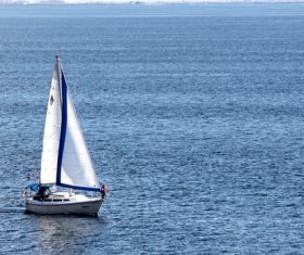 Small sailing boat at sea Stock Photo 05