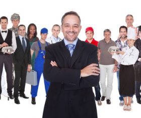 Smiling businessman and people of different professions Stock Photo
