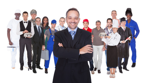 Smiling businessman and people of different professions Stock Photo