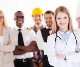 Smiling female doctor and people of different professions Stock Photo