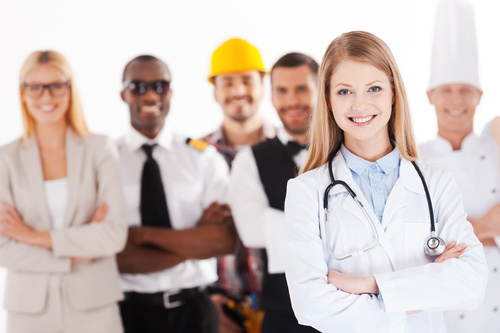 Smiling female doctor and people of different professions Stock Photo