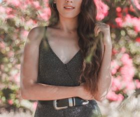 Stock Photo Beautiful woman with flower background