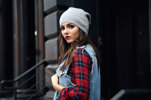 Stock Photo Girl wearing a knit cap wearing a denim jacket