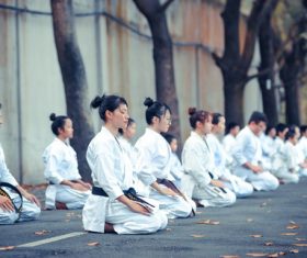 Stock Photo People knelt meditation